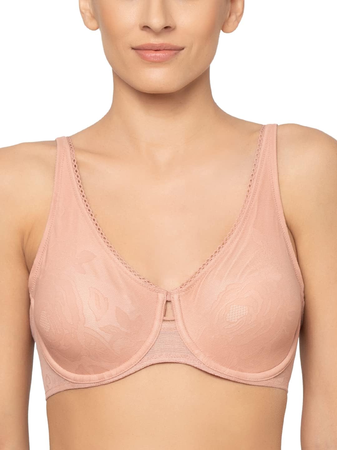 Soutien-gorge minimiseur Triumph porté sous un vêtement moulant